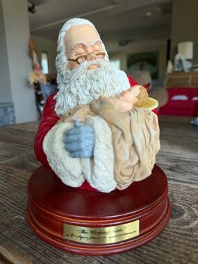 The Weeping Santa Holding Baby Jesus exclusively by Roman Inc. 1997